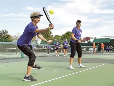 Women play pickleball