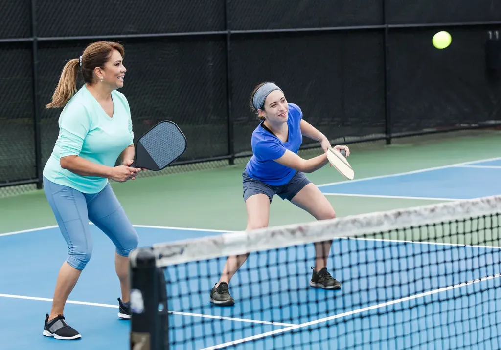 Pickleball two women play 