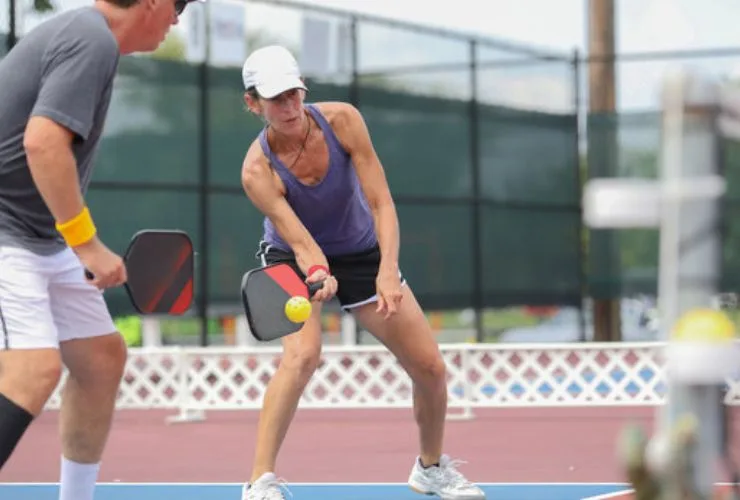 Women play pickleball